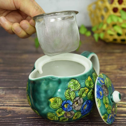 【made in japan】
Elegant Kyusu Teapot - Kutani Ware Green Camellia Design, Japanese Ceramic Pot with Tea Strainer, Brand Dishware, Made in Japan. Perfect for Tea Lovers!