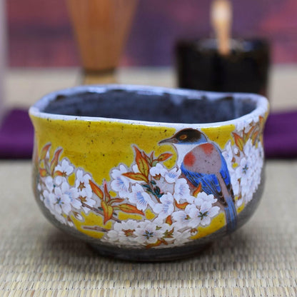 Kutani matcha bowl with cherry blossom & bird design—authentic handmade Japanese tea ware.
