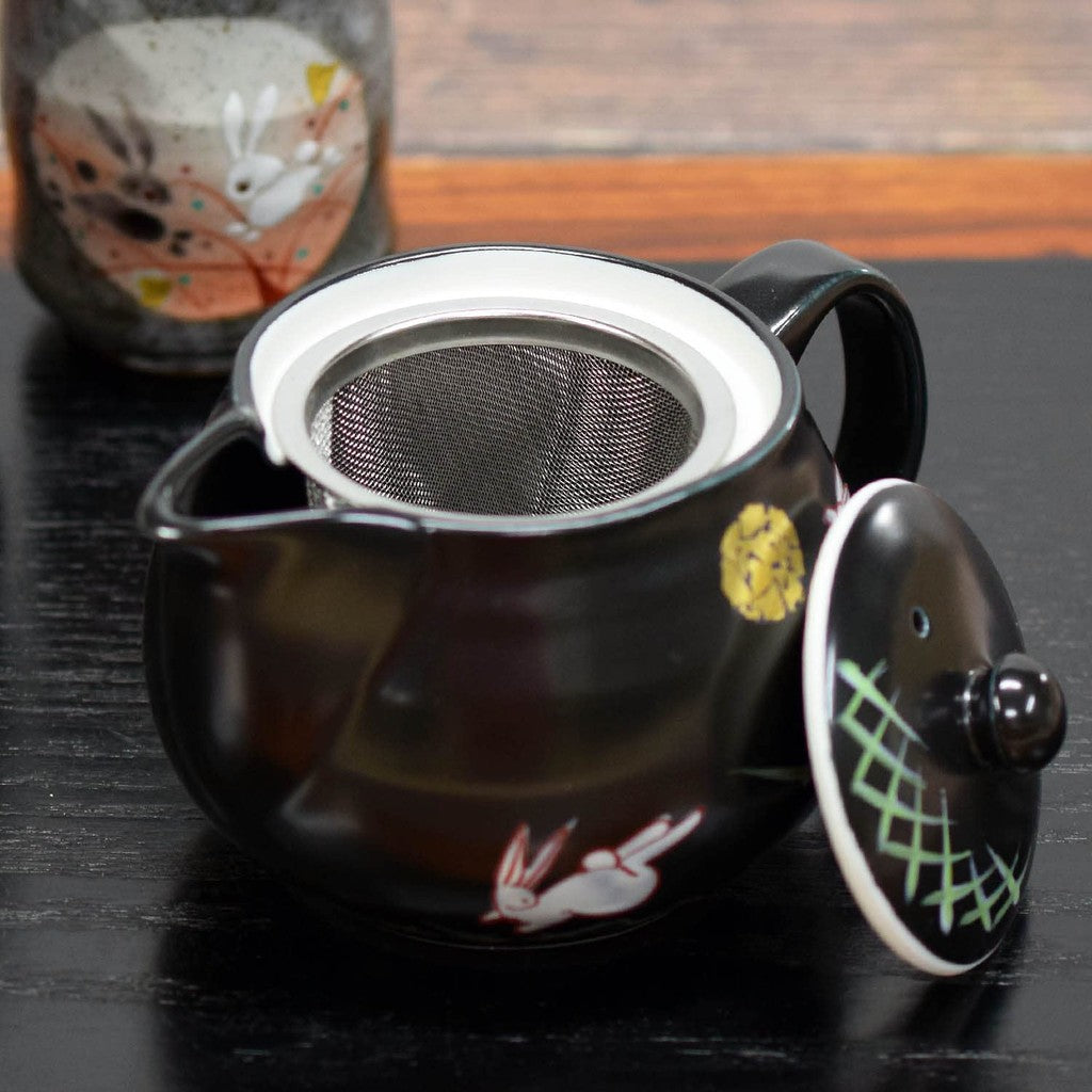 Stylish Japanese Kyusu Teapot, Kutani Ware Moon Rabbit Design, Elegant Ceramic Pot with Inline Mesh Strainer, Brand: Waza no Kura, Made in Japan, Perfect Tableware for Tea Lovers.