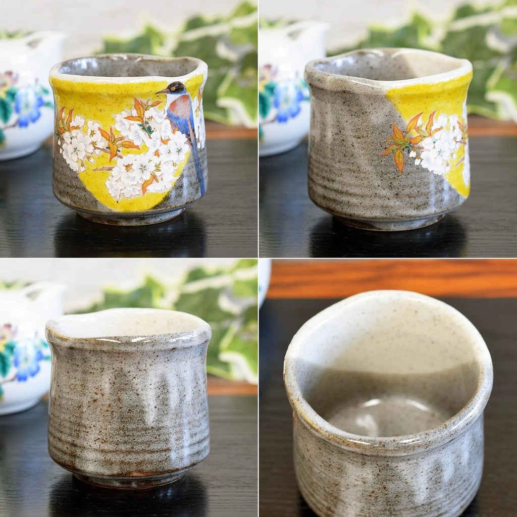 Kutani tea cup with Yoshidaya cherry blossoms and birds—premium Japanese ceramic ware.