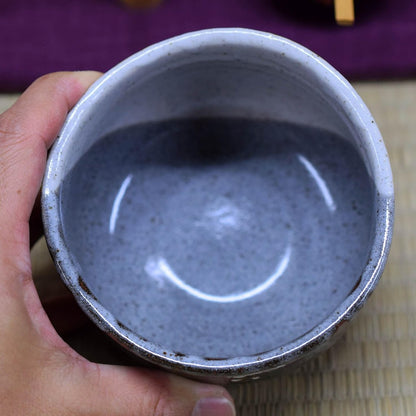 Kutani matcha bowl with cherry blossom & bird design—authentic handmade Japanese tea ware.