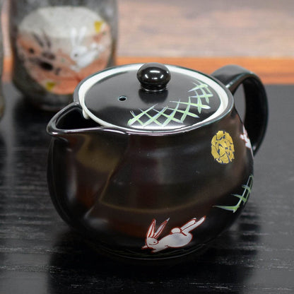 Stylish Japanese Kyusu Teapot, Kutani Ware Moon Rabbit Design, Elegant Ceramic Pot with Inline Mesh Strainer, Brand: Waza no Kura, Made in Japan, Perfect Tableware for Tea Lovers.