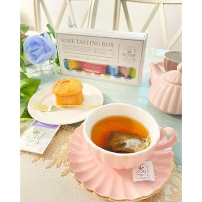 Kobe Tea Tasting Box - 28 bags of 7 varieties of loose leaf tea, meticulously selected by a tea sommelier. Includes Earl Grey, Darjeeling, English Breakfast, Royal Blend, and flavored teas in individual packaging. A luxurious tea gift with stylish tea bag