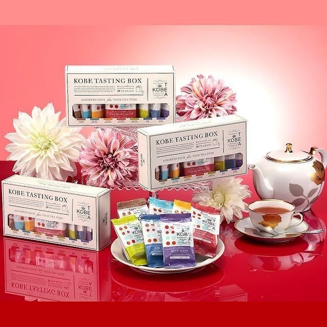 Kobe Tea Tasting Box - 28 bags of 7 varieties of loose leaf tea, meticulously selected by a tea sommelier. Includes Earl Grey, Darjeeling, English Breakfast, Royal Blend, and flavored teas in individual packaging. A luxurious tea gift with stylish tea bag