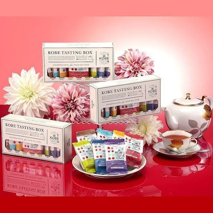 Kobe Tea Tasting Box - 28 bags of 7 varieties of loose leaf tea, meticulously selected by a tea sommelier. Includes Earl Grey, Darjeeling, English Breakfast, Royal Blend, and flavored teas in individual packaging. A luxurious tea gift with stylish tea bag