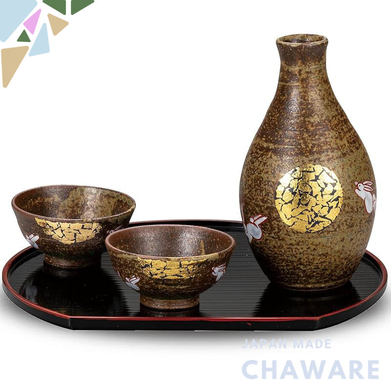 Stylish Kutani Ware Sake Set with Rabbit Design, featuring a Tokkuri and Guinam, complete with a tray. Perfect for birth