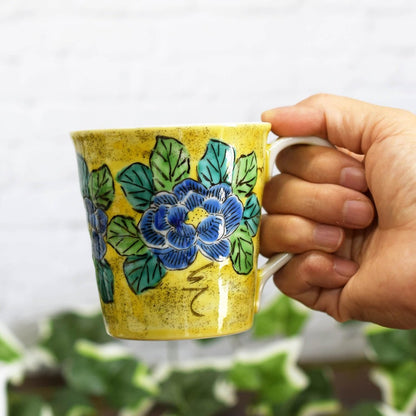 Stylish Kutani pottery mug pair set by Waza no Kura / Yoshidaya, high-quality porcelain tableware made in Japan, perfect for your elegant dining experience. Tea cup